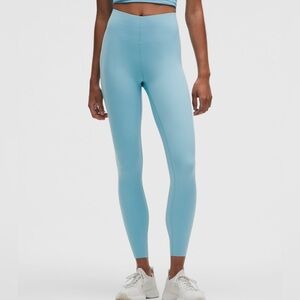 NWT lululemon Glow Up HR Tight in Blue. Size 6.